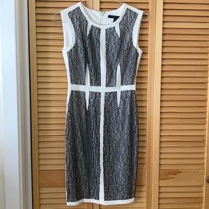 New - BCBG “Rumor” white dress with black lace.